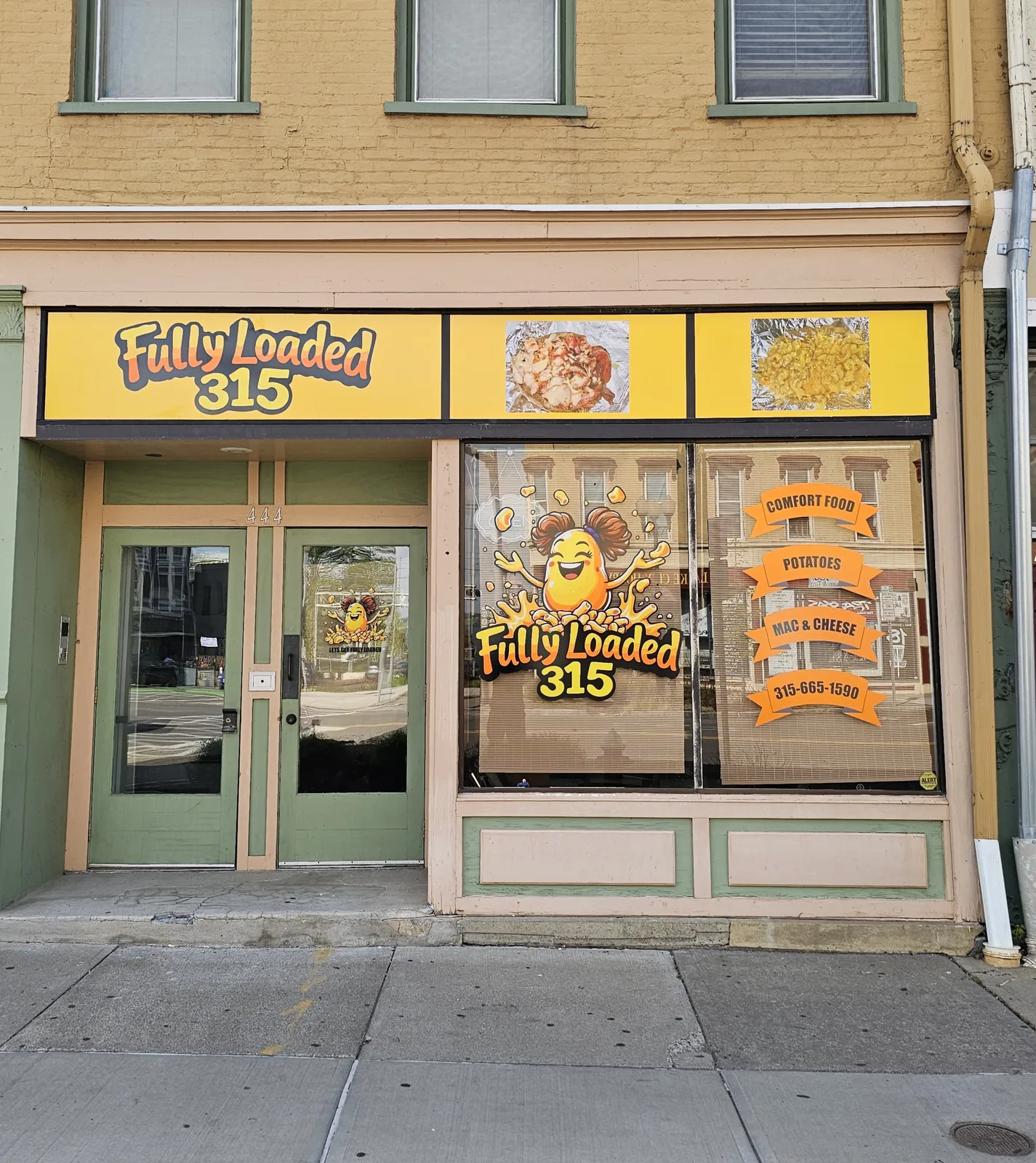 Fully Loaded 315 storefront with window wrap character masco
