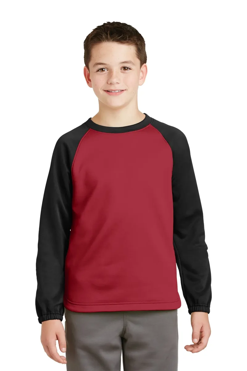 DISCONTINUED Sport-Tek® Youth Sport-Wick® Raglan Colorblock Fleece Crewneck. YST242